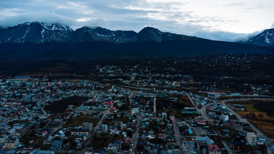 Breathtaking Private Excursion Iguaçu Waterfalls Brazilian Side Review: An Unforgettable Journey to Nature's Most Spectacular Wonder Review 2026 - A stunning aerial view of Ushuaia, Argentina with snow-capped mountains in the backdrop during twilight.