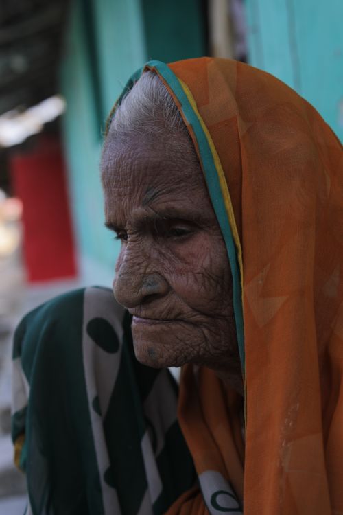 Free A thoughtful portrait of an elderly Indian woman showing wisdom and experience. Stock Photo