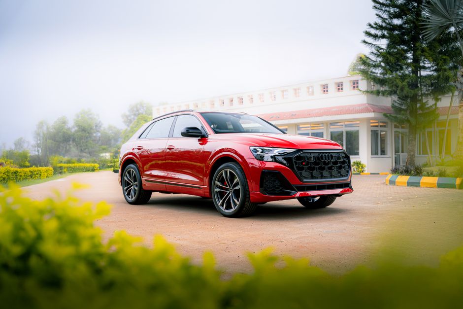 Beautiful red car against a scenic backdrop, perfect for car enthusiasts and automotive design lovers.