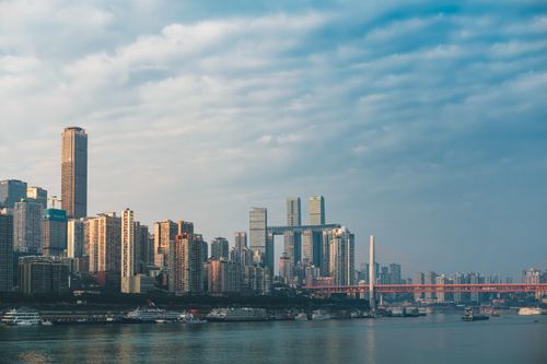 Free Panoramic view of Chongqing skyline with Yangtze River and urban architecture. Stock Photo