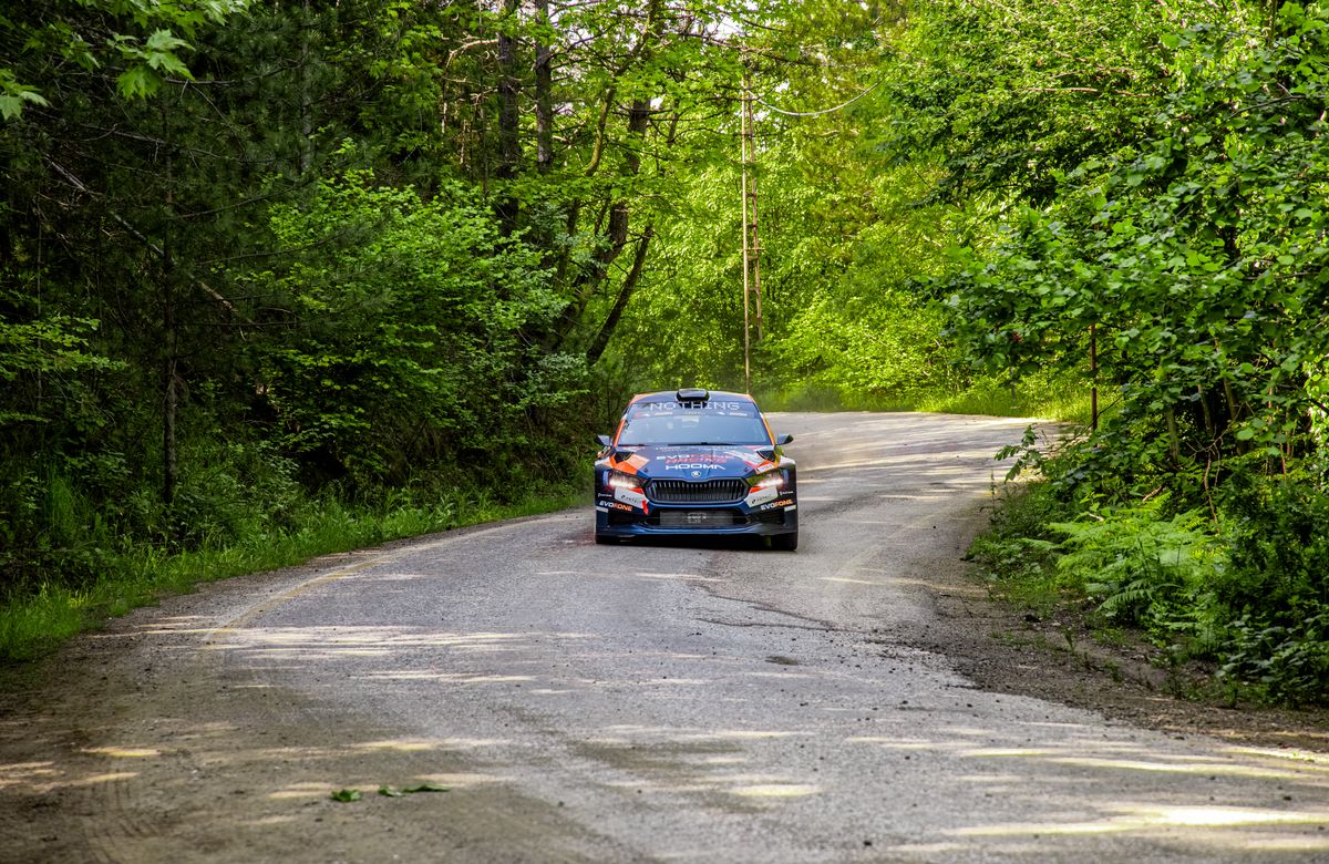 Rally car on a forest gravel stage, by Hobi Photography on Pexels