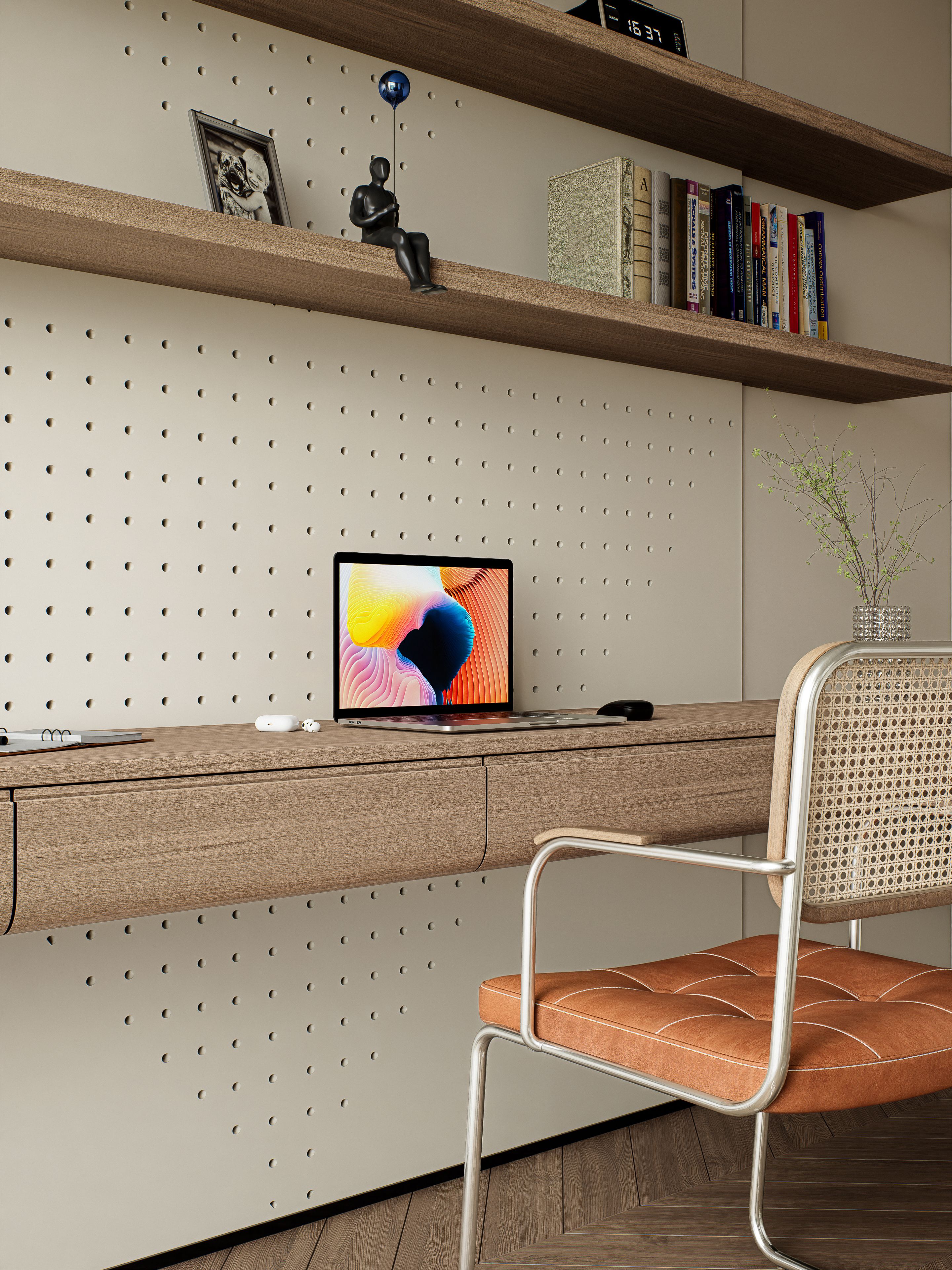 Contemporary home office with elegant decor featuring a laptop and minimalistic wooden shelves.