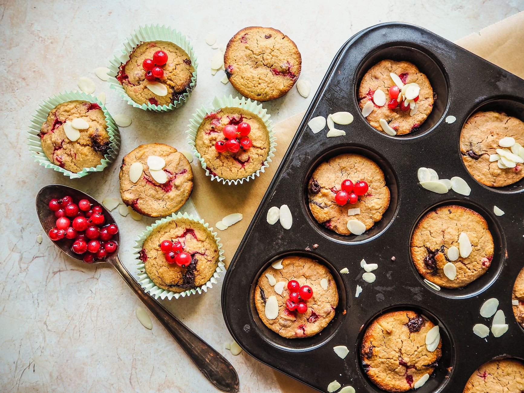 Freshly baked keto cream cheese muffins with almond flour on a rustic plate