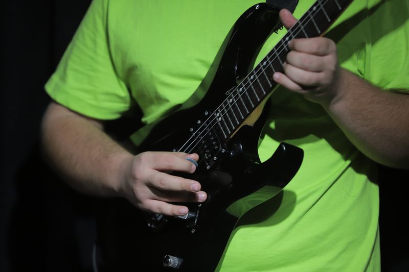 Guitarrista em sessão de estúdio
