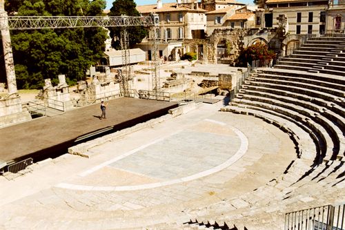 Free Explore the ancient Roman amphitheater in Arles, France, captured in bright daylight, emphasizing its historic architecture. Stock Photo