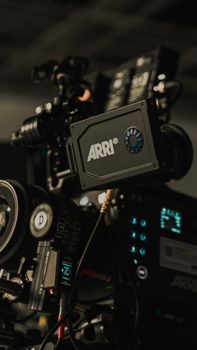Detailed close-up of a professional ARRI cinema camera setup, highlighting filmmaking equipment.