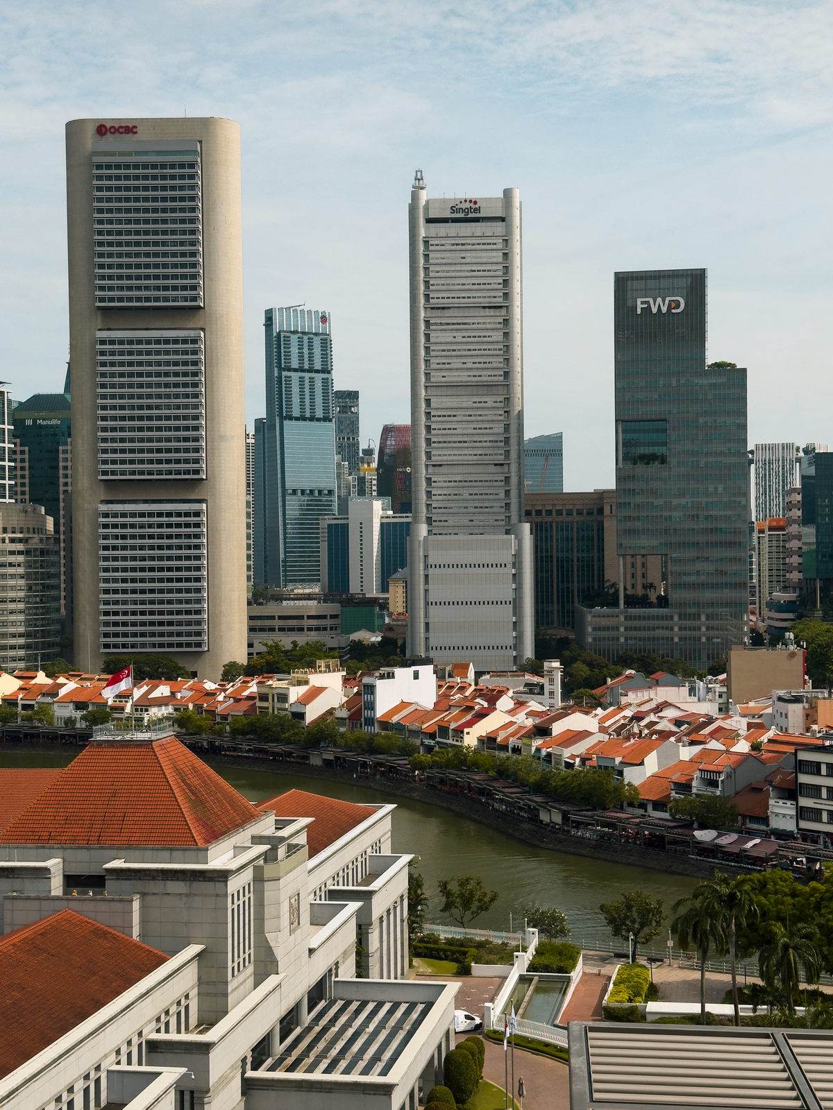 US stocks investing from Singapore - trading screens and Singapore skyline