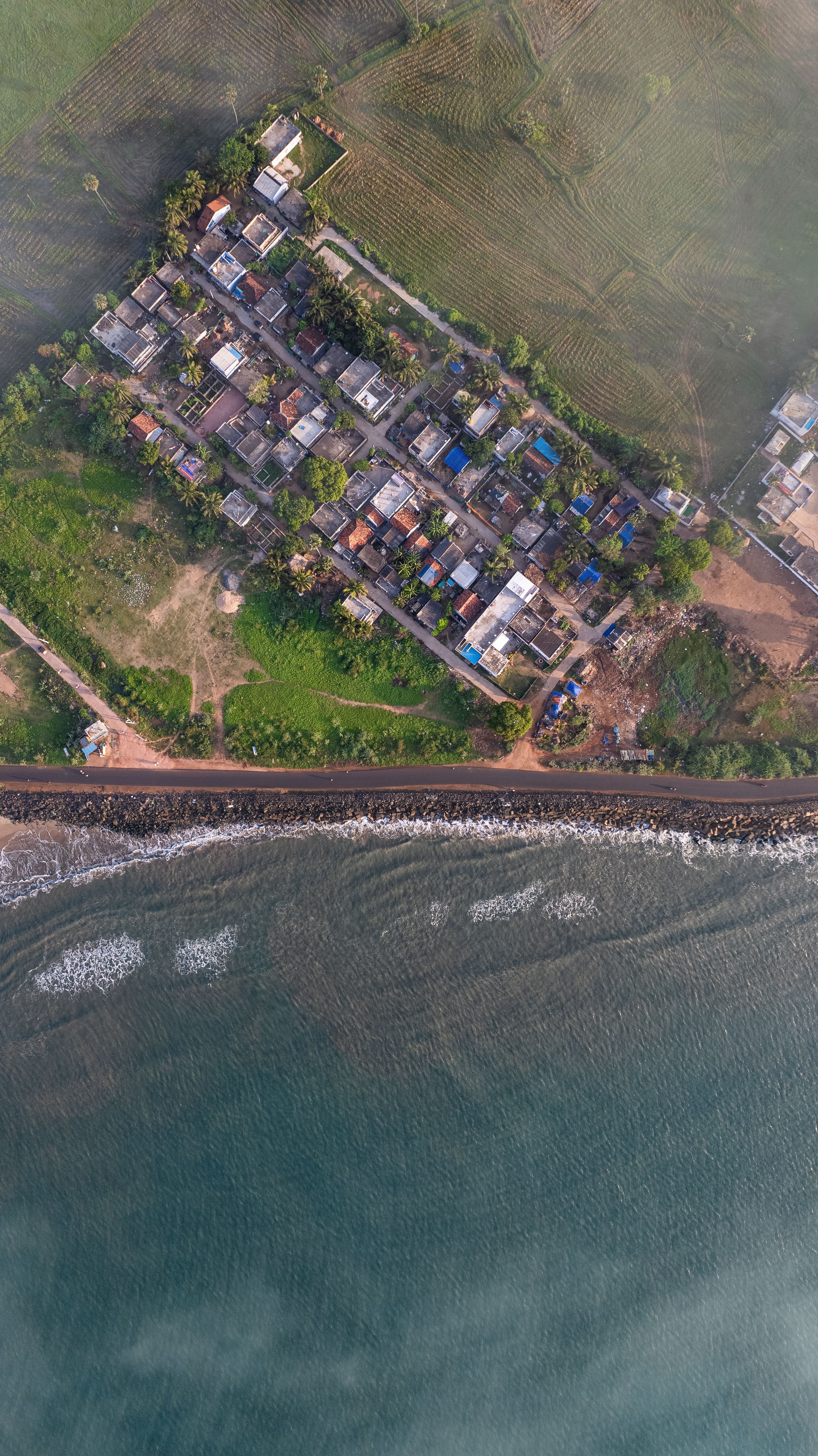 Aerial View of Coastal Town and Shoreline · Free Stock Photo