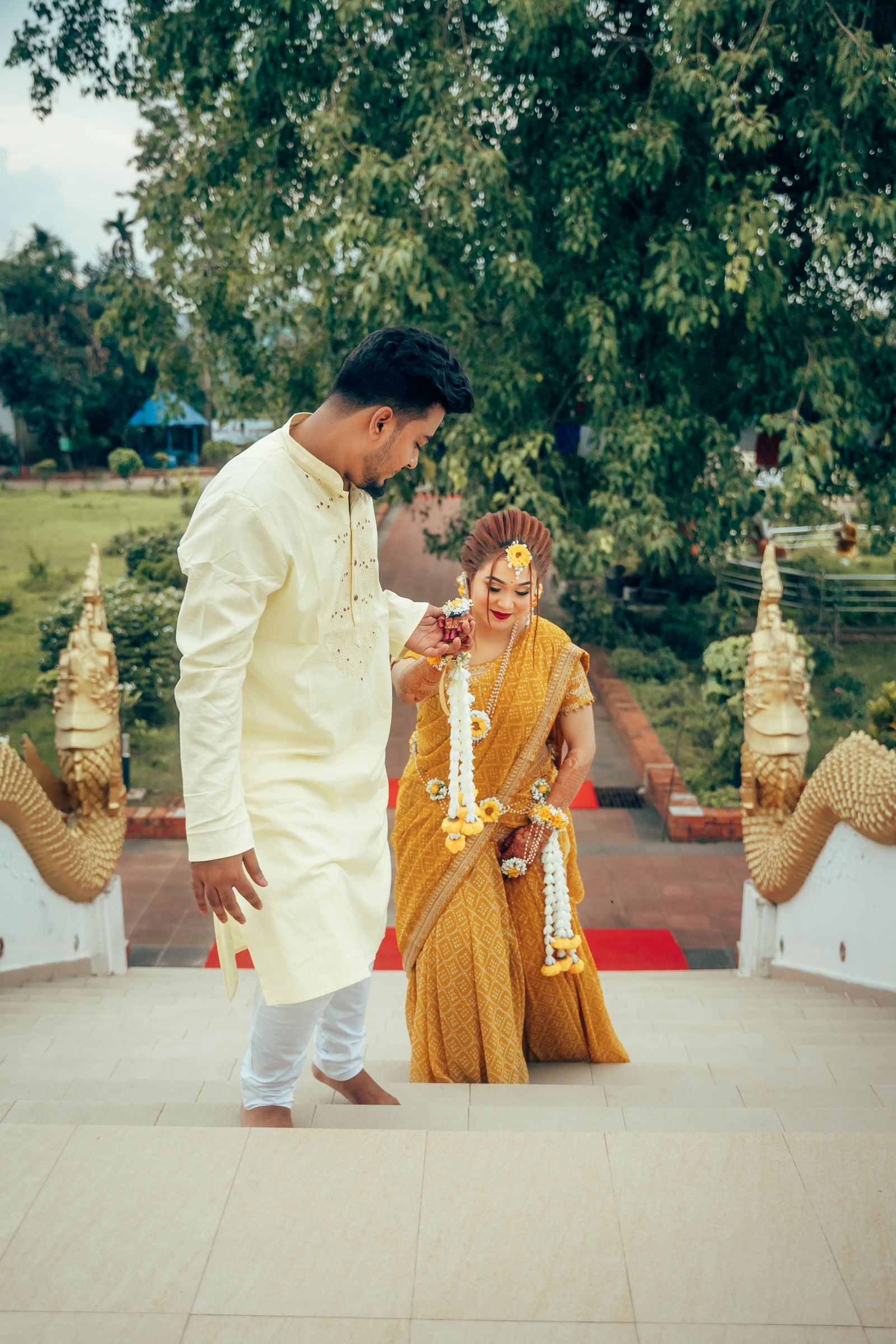 Couple in traditional attire during a pre-wedding ceremony