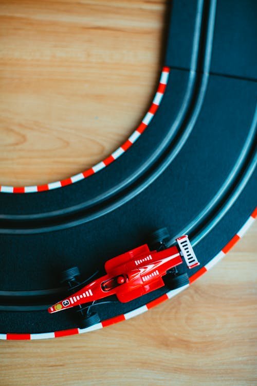 Free Top View Photo of Toy Car in Race Track Stock Photo