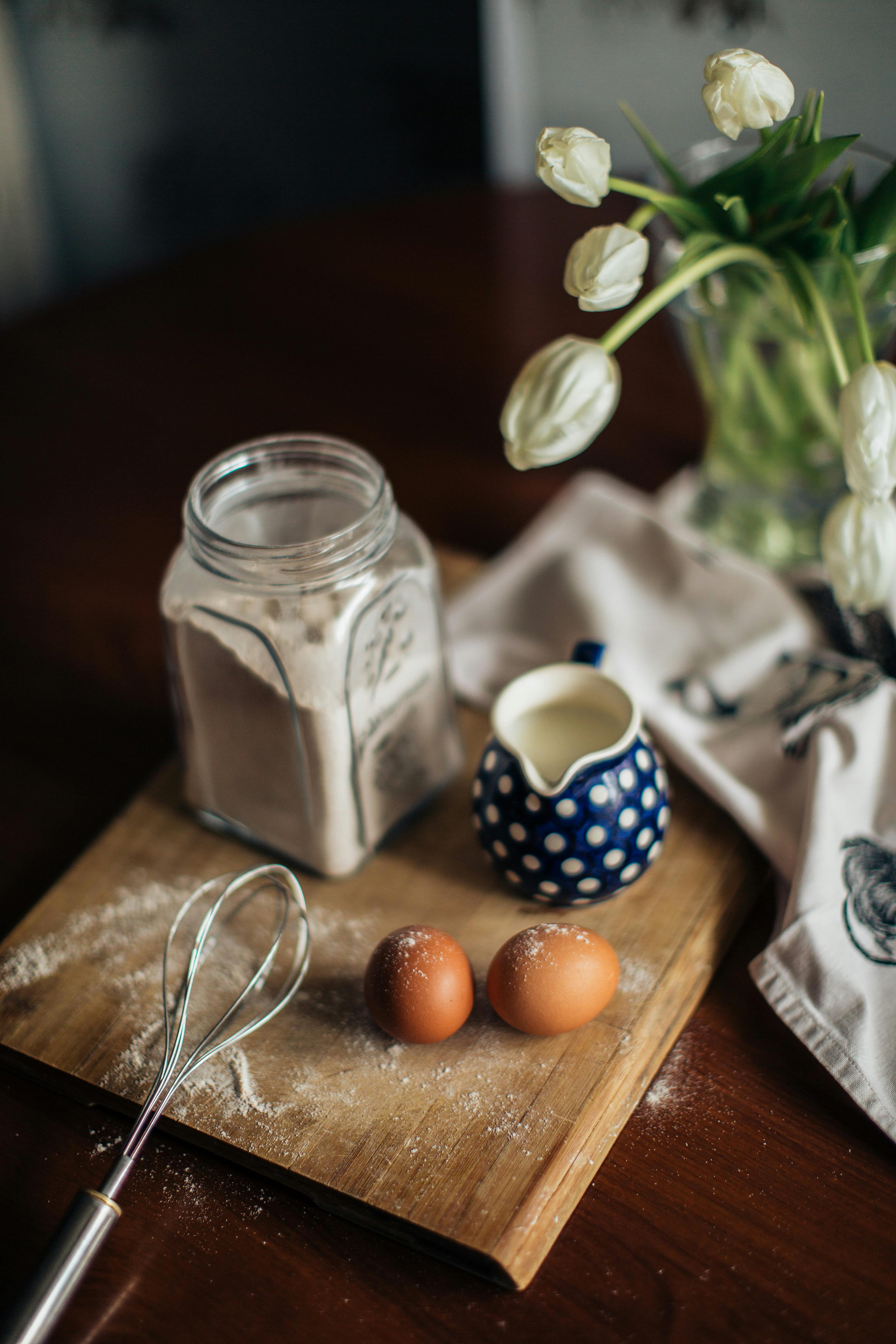 Front View Orange Juice Vase Pink Tulips Table Modern Kitchen Stock Photo  by ©EdZbarzhyvetsky 190380286