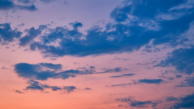 Golden hour sky in Gia Lai, Vietnam with striking pink and blue clouds at sunset.