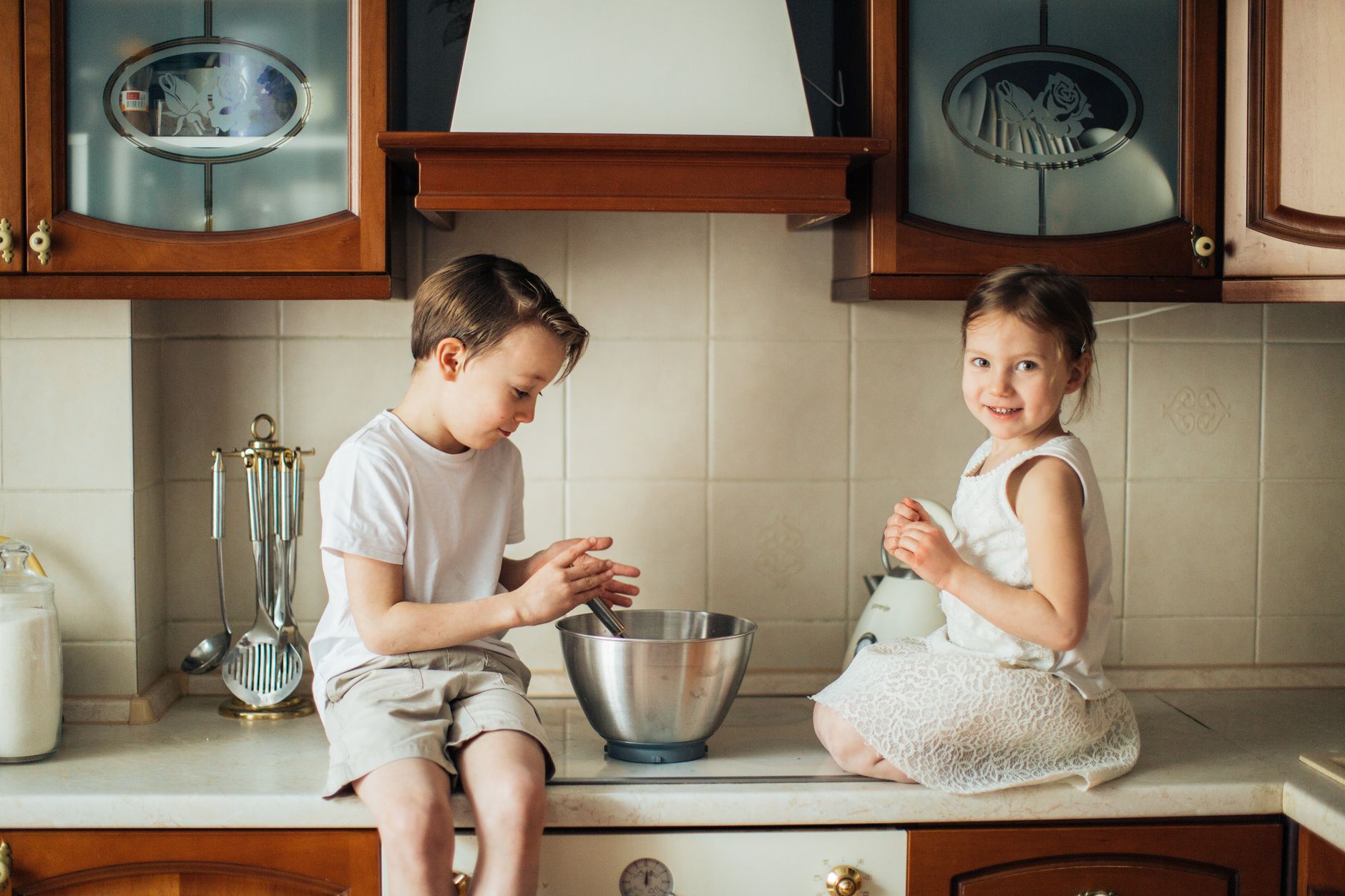 Photo of Kids Playing on Kitchen Counter Top · Free Stock Photo