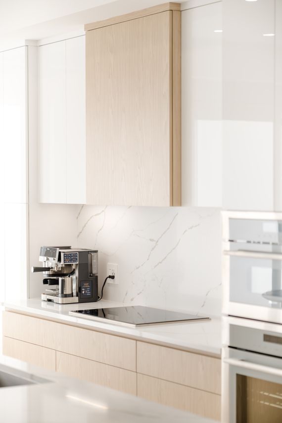 Modern kitchen with a coffee machine and built-in appliances