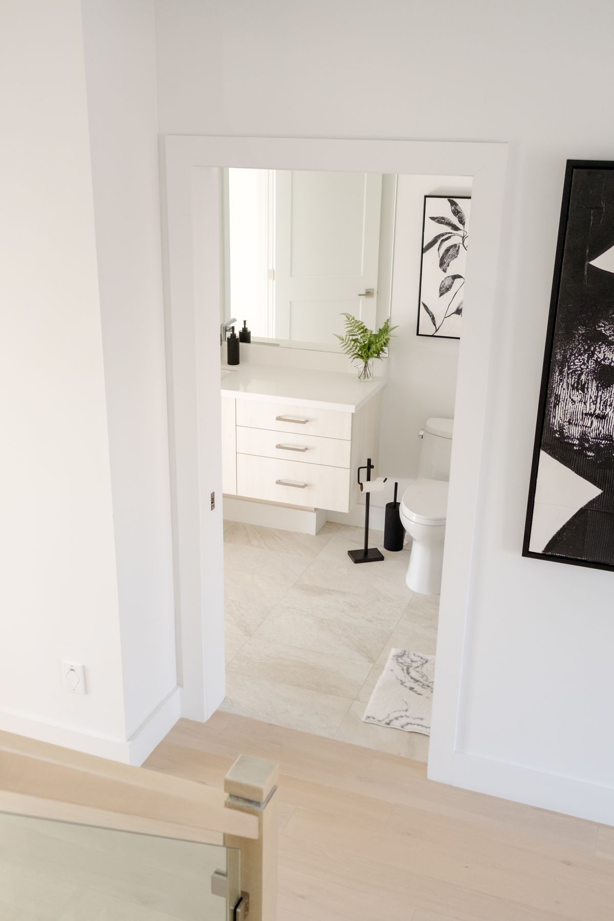 Bright and clean minimalist bathroom with modern decor and neutral tones. Stock Photo.