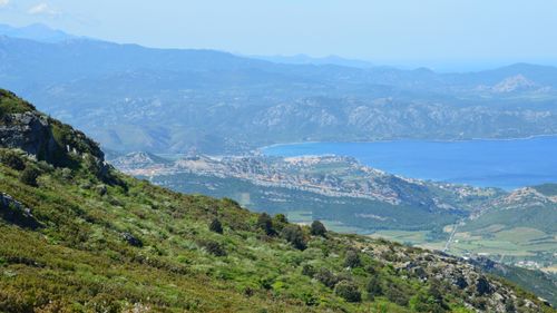 Free A breathtaking aerial view of Bastia's coastline and mountains in Corse, France, showcasing natural beauty. Stock Photo