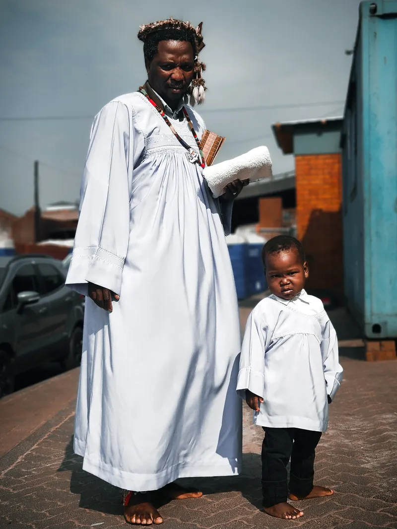 A father and child in traditional attire in Johannesburg
