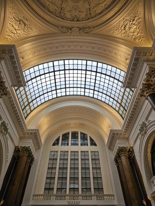 Free Elegant interior featuring a beautiful glass dome and ornate architectural details. Stock Photo