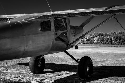 Classic vintage airplane captured in black and white on Sylt airfield.
