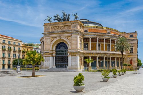 Free View of Teatro Politeama Garibaldi in Palermo, Sicily, with clear blue skies. Stock Photo