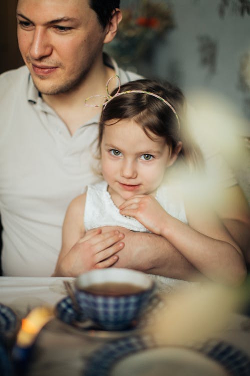 Free Photo of Man Carrying His Child Stock Photo