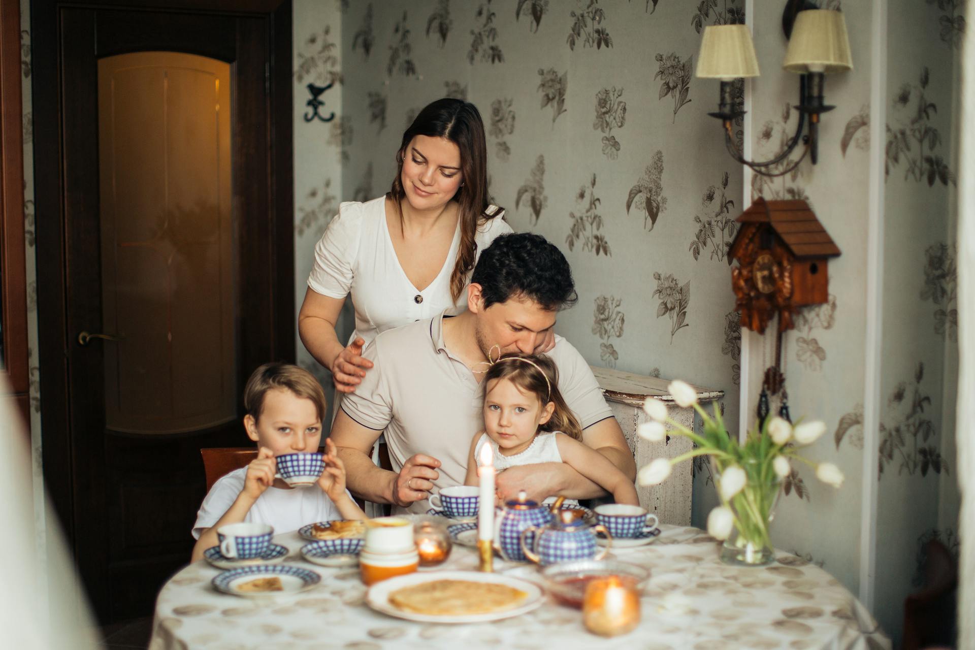 Family Sitting at Table