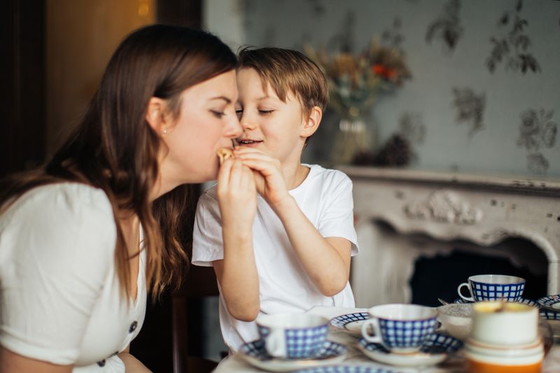 Person recognising the difference between emotional hunger and physical hunger representing the awareness step that research identifies as the foundational skill for interrupting emotional eating patterns before they become automatic