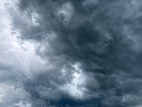 Intimidating storm clouds gather, creating a dramatic and moody atmosphere.. intimidating, storm, clouds
