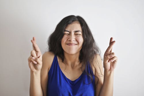 Free Woman in Blue Tank Top Smiling Stock Photo