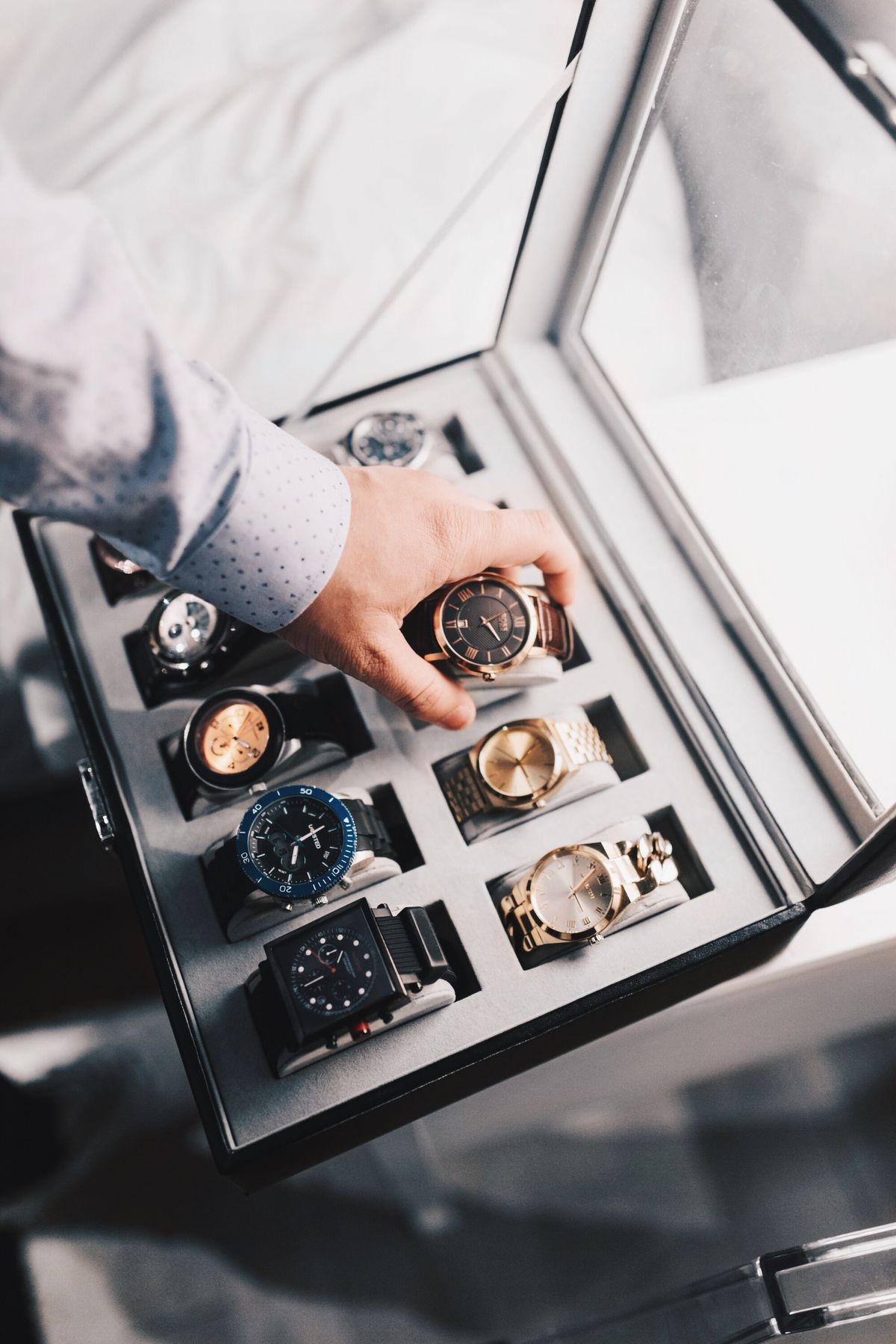 Luxury watch being inspected before sale