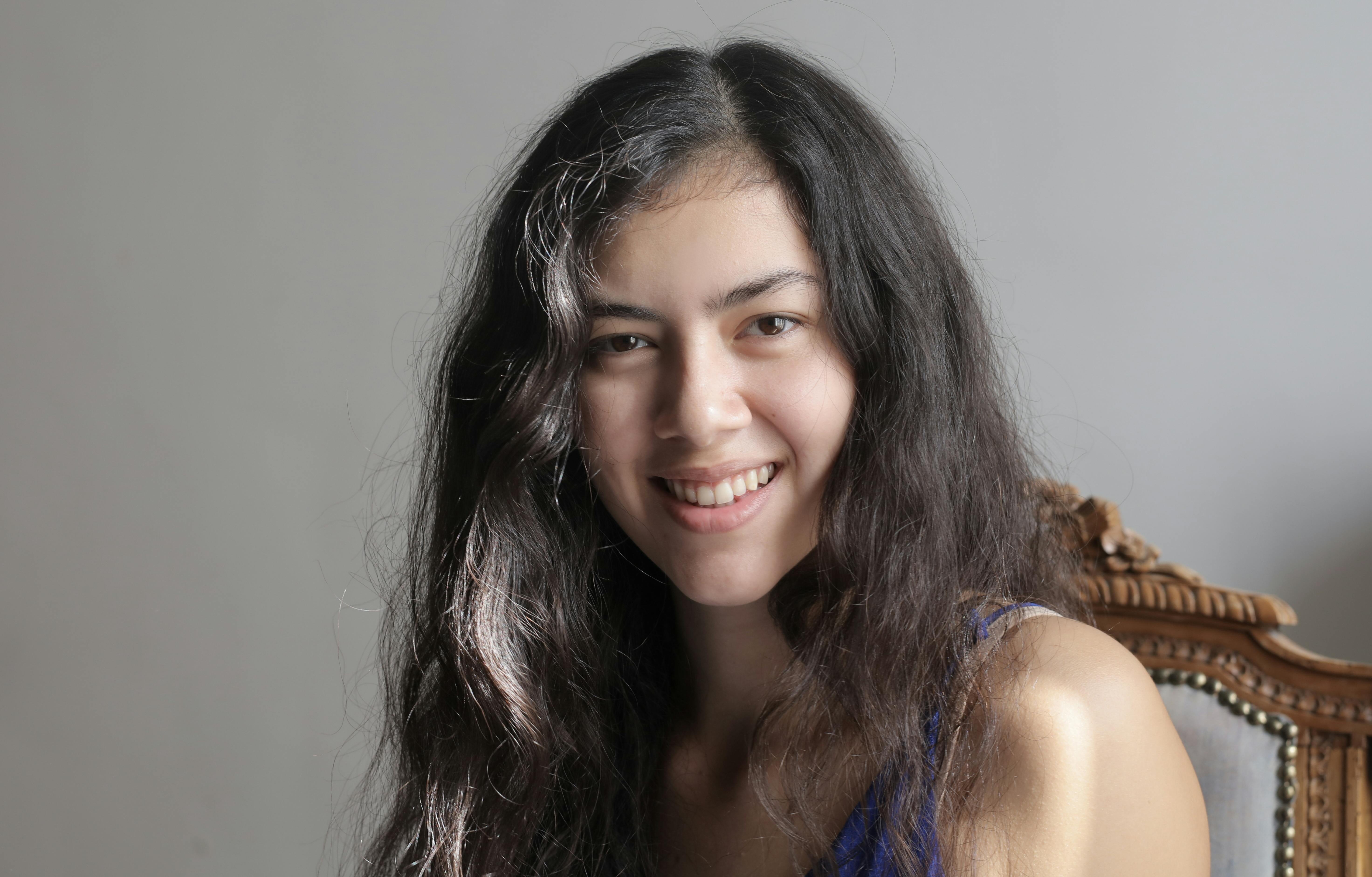 young ethnic woman smiling at camera