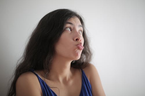 Free Woman Pouting Her Lips Stock Photo