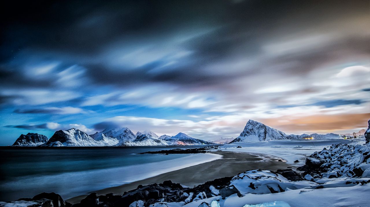 captivating winter scene of nordland s snow covered coast at twilight