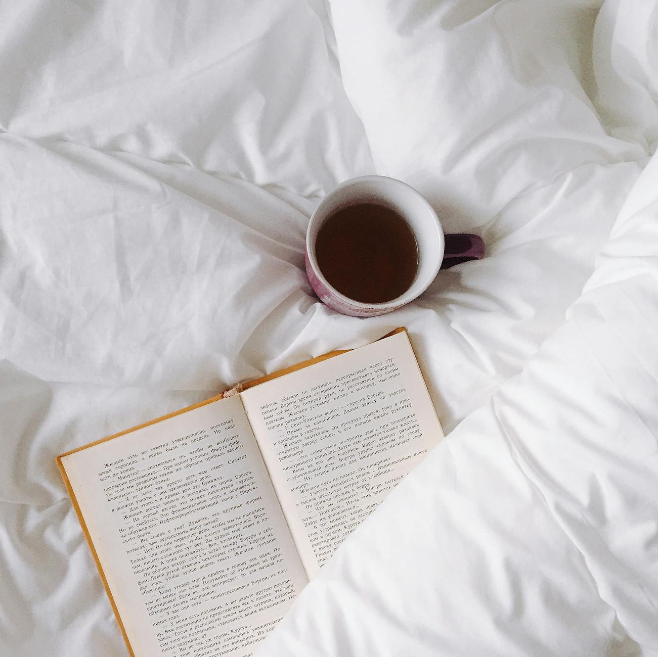 https://www.pexels.com/photo/white-ceramic-mug-on-white-textile-3808243/