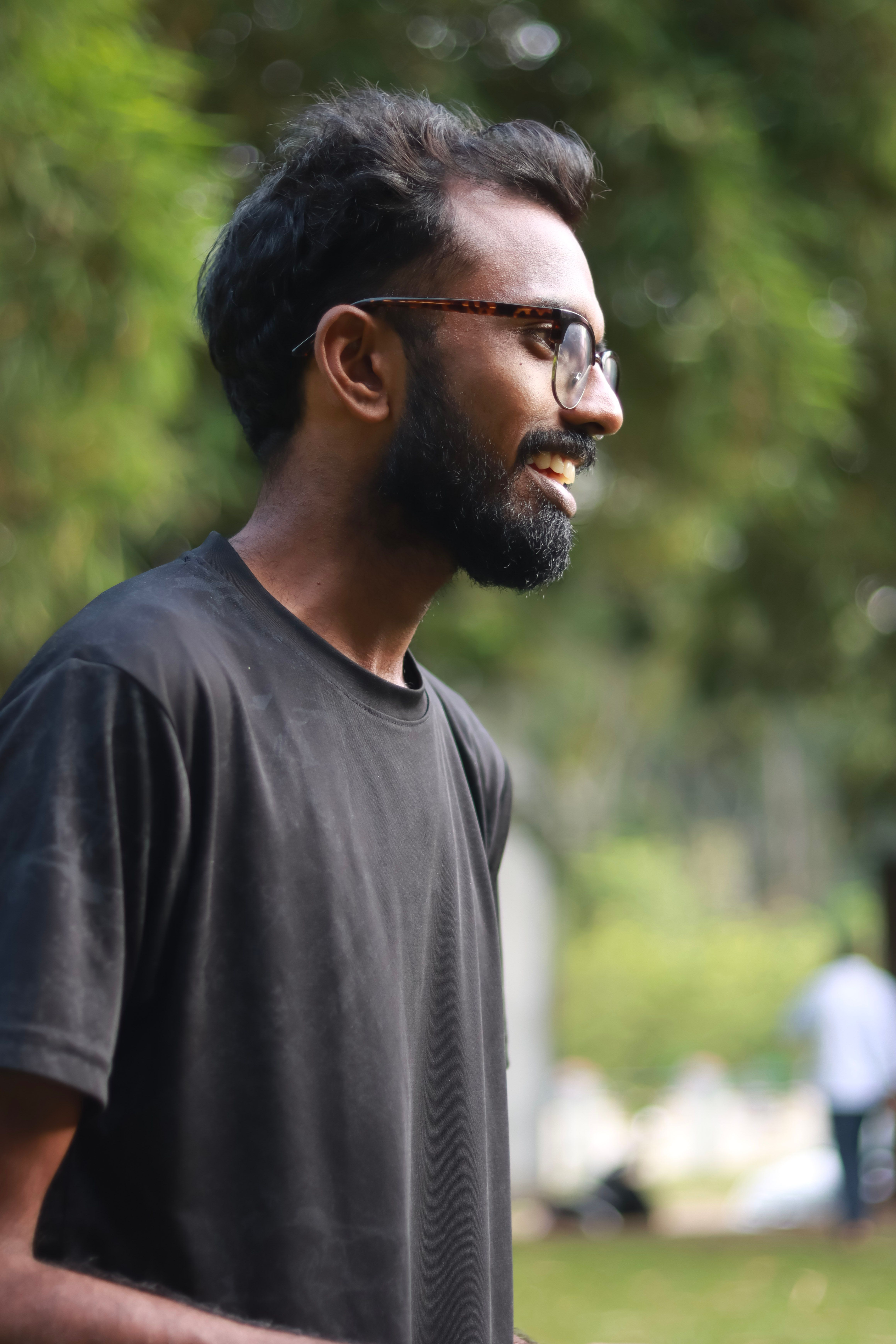young-man-smiling-outdoors-in-madikeri-free-stock-photo
