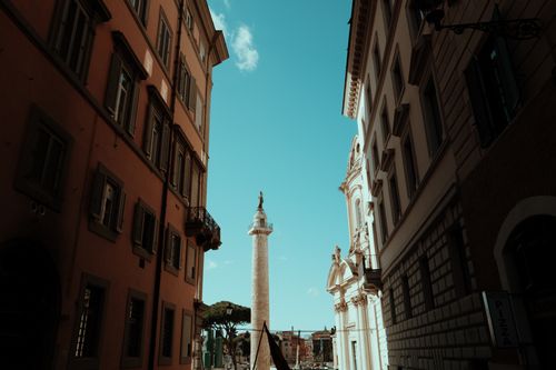 Ancient Column in Central Rome Cityscape · Free Stock Photo