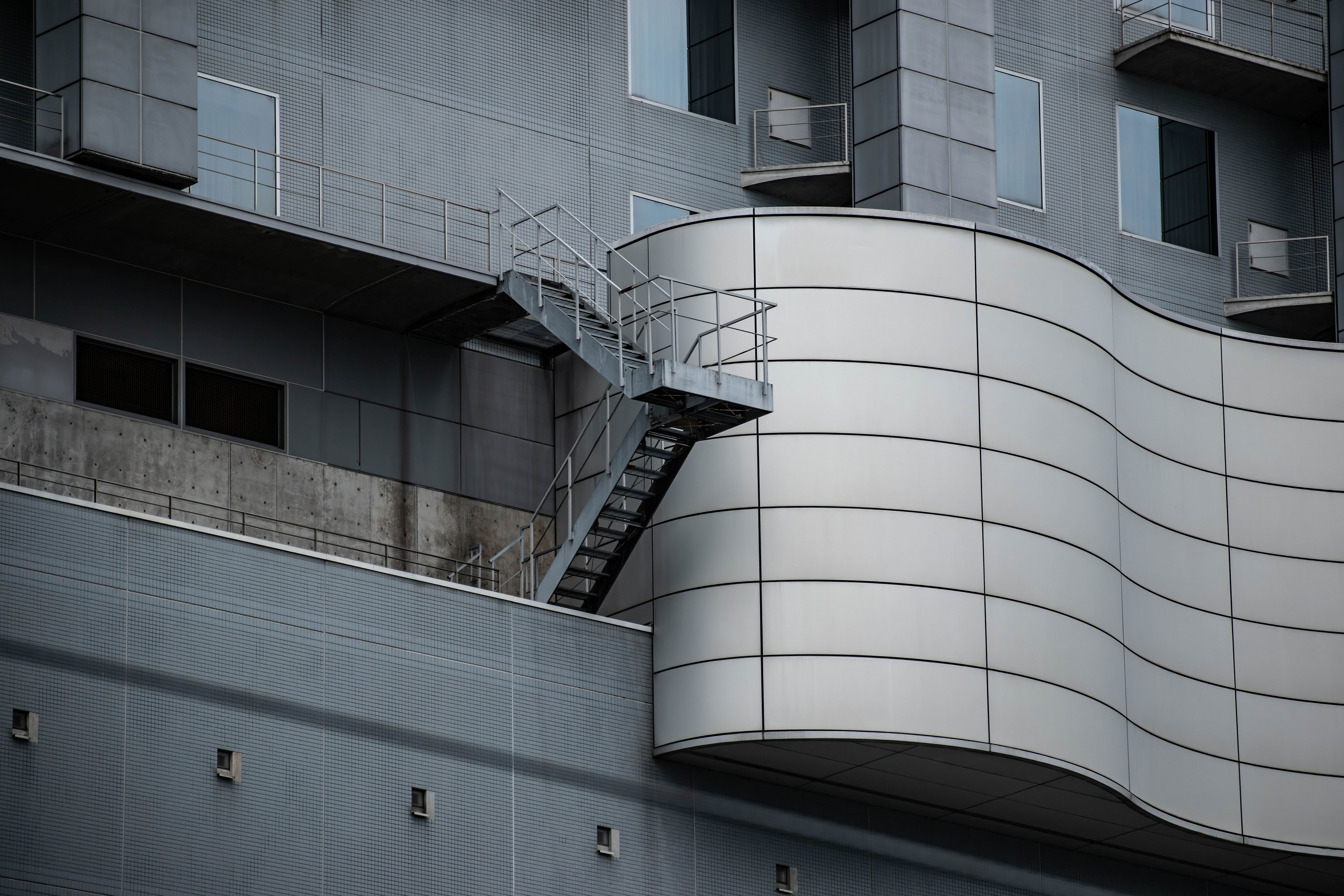 Close-up of a modern building facade in Kyoto, showcasing contemporary architecture.