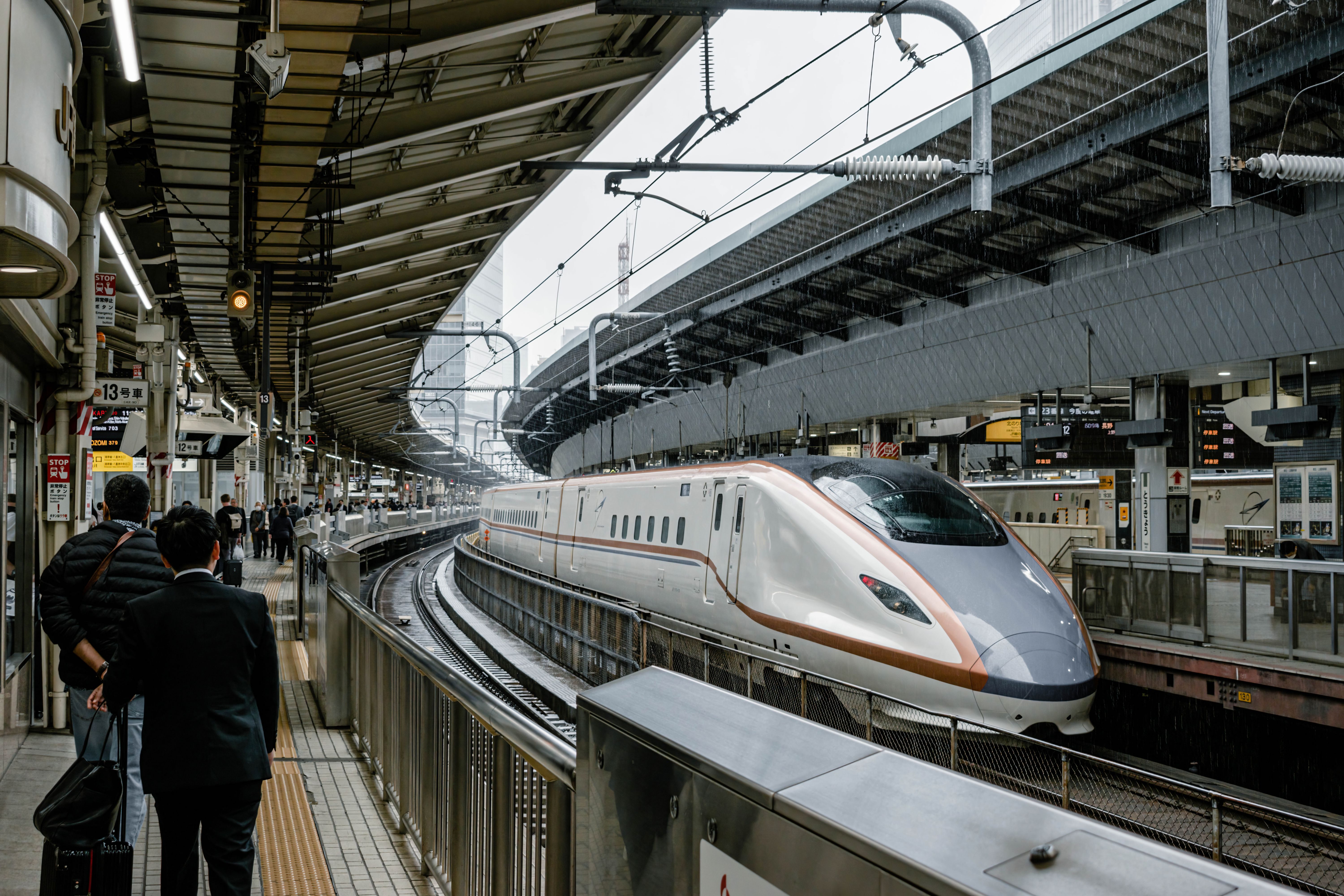 sleek shinkansen arriving at a modern station platform