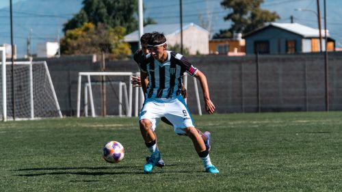 Free Dynamic soccer action on a sunny day with two players competing intensely. Stock Photo
