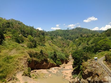 Beautiful landscape of lush hills in Welimada, Uva Province, captured in daylight.