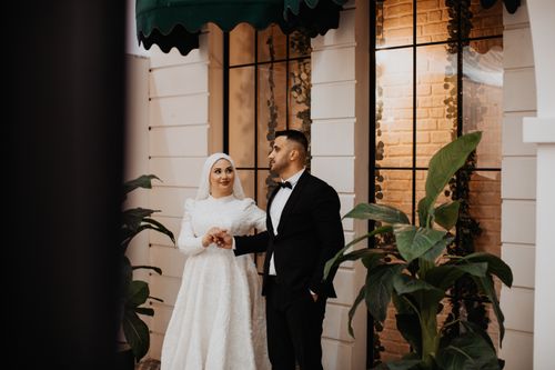 Free Beautiful wedding couple posing in a romantic Istanbul location. Stock Photo