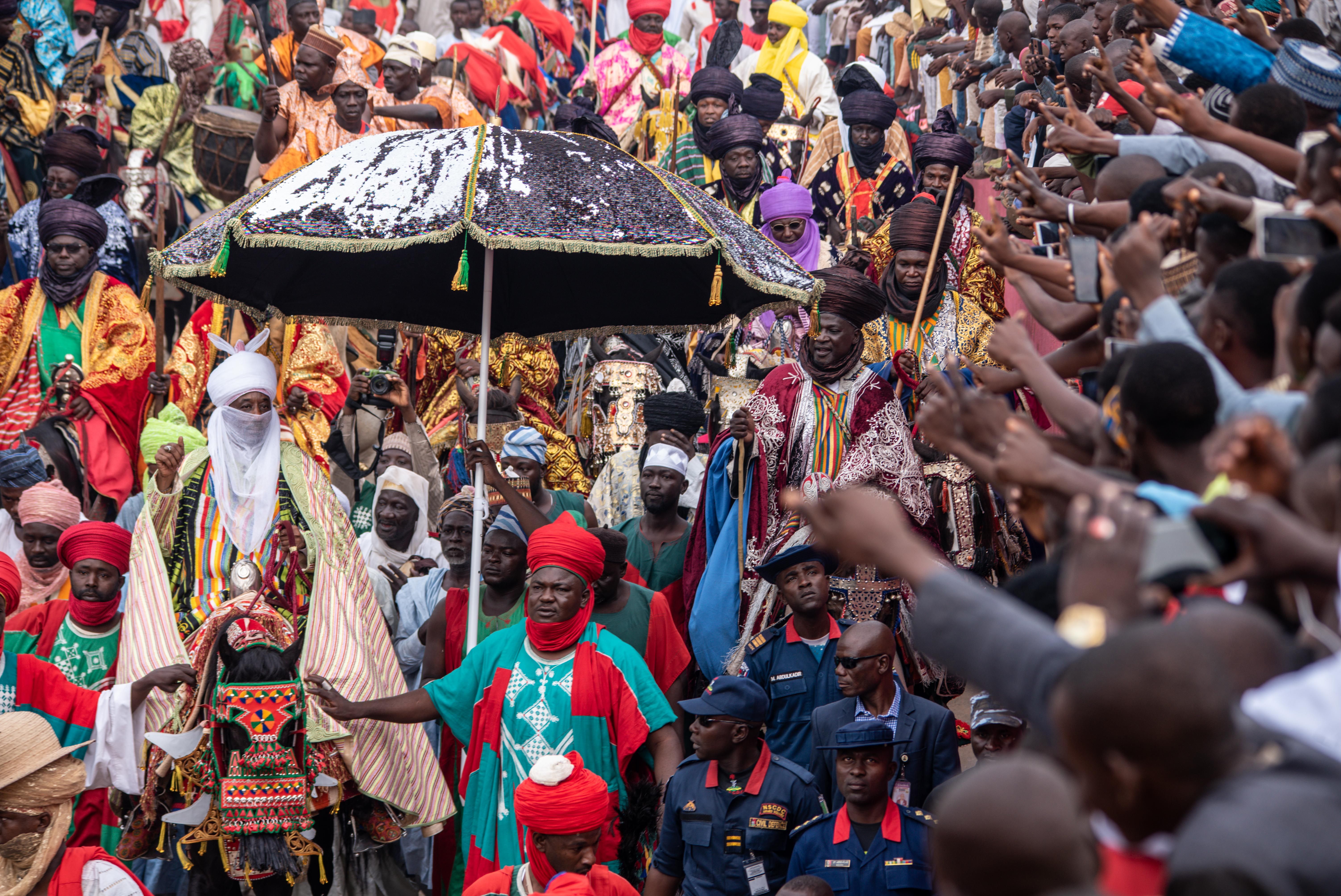 Colorful and lively festival in Africa showcasing traditional attire and cultural heritage.