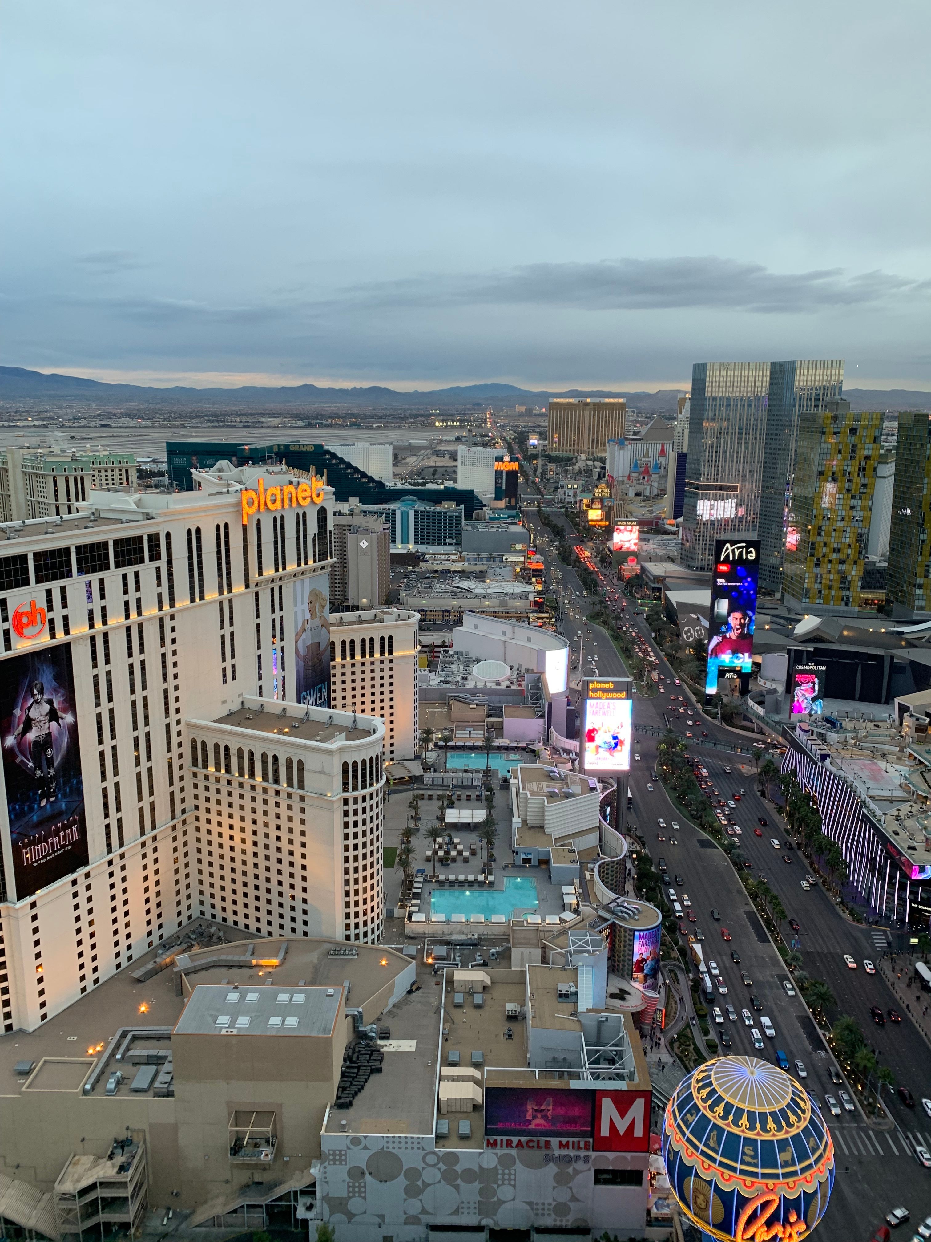Captivating aerial view of the vibrant Las Vegas Strip during dusk showcasing iconic landmarks.