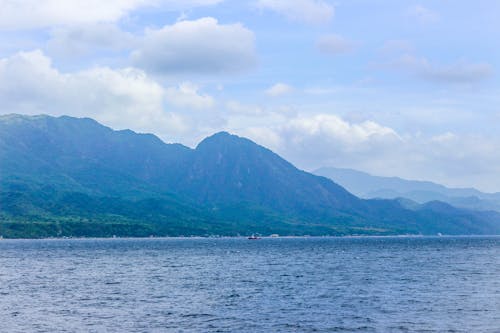 Free stock photo of blue sea, green mountains, mountain Stock Photo