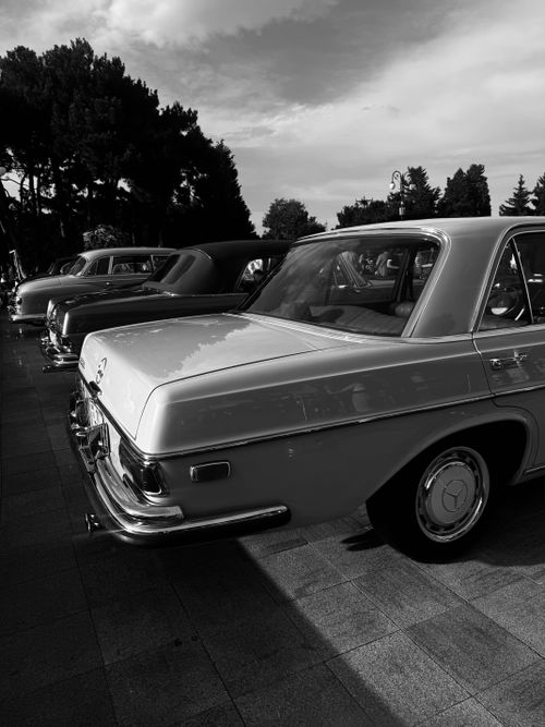 Free Lineup of vintage cars captured in a high contrast black and white style. Stock Photo
