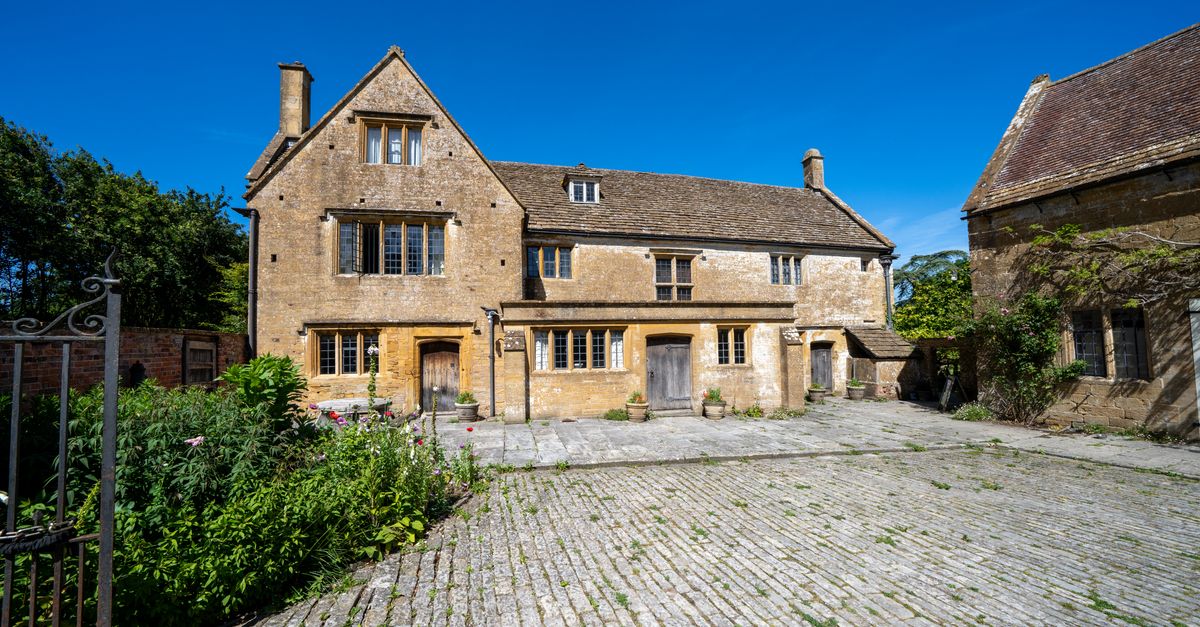 Charming historic stone building with garden in Somerset, UK.