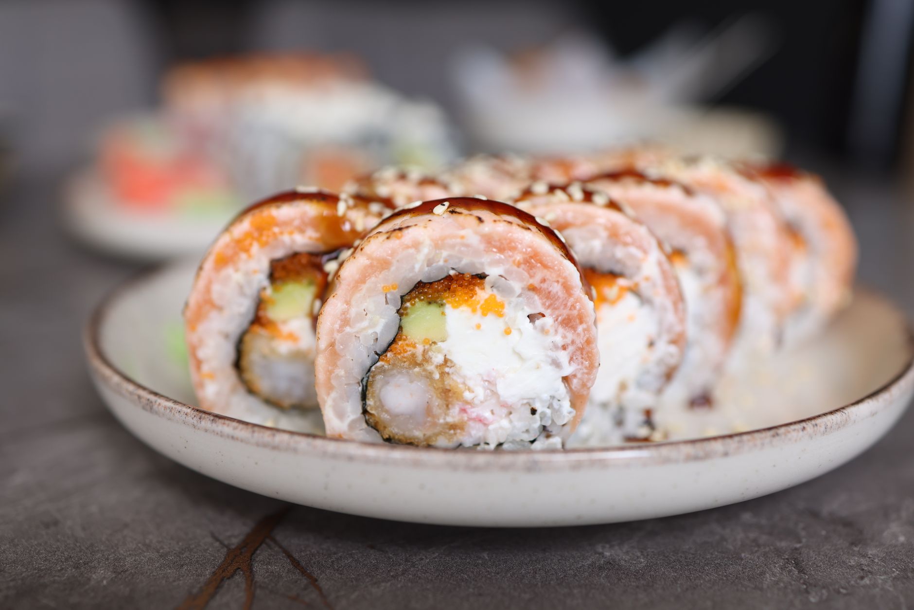 Japanese miso soup and sushi roll served together
