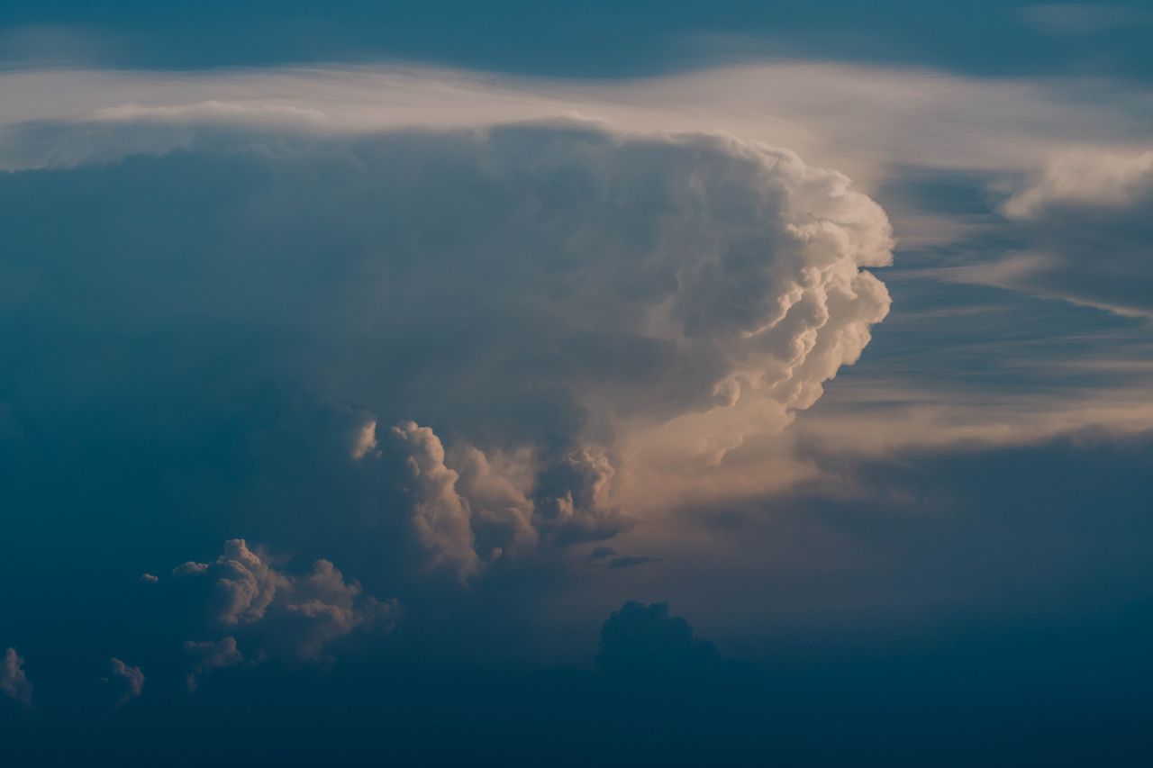 majestic view of a cumulonimbus cloud against a serene sky showcasing