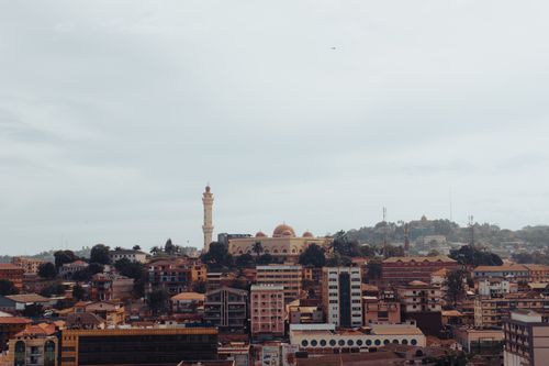Free Scenic aerial view of Kampala with a beautiful mosque and urban landscape. Stock Photo