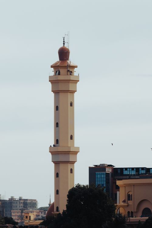 Free Scenic view of a traditional mosque minaret in Kampala, Uganda showcasing Islamic architecture. Stock Photo